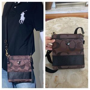 Coach Black/Aubergine Brown Signature Canvas Swingpack Adjustable Crossbody Bag